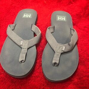 Worn a couple times Helly Hansen flip-flops.
